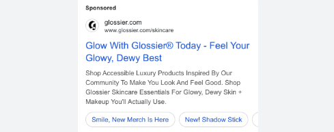 Sponsored Glossier skincare ad with a headline about glowing skin and copy highlighting products inspired by the community.